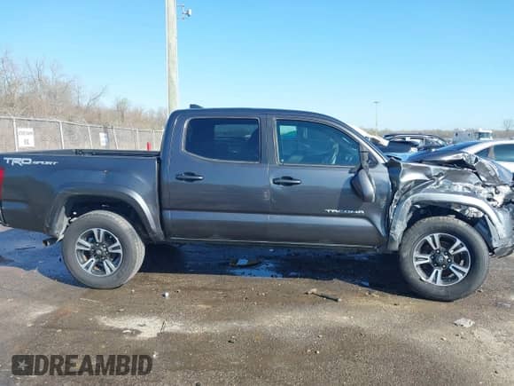 2017 Toyota Tacoma TRD Off Road with VIN 5TFAZ5CN2HX027623, listed as a IAAI auction lot 41731461 with 103,232 mi miles and . Bid and sale history available at DreamBid. Image 13.