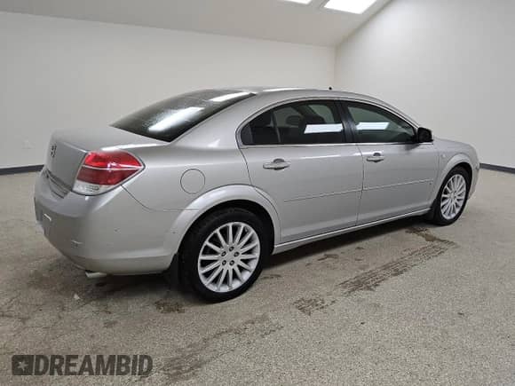 2007 Saturn Aura XR with VIN 1G8ZV57777F158782, listed as a Copart auction lot 69064035 with 142,882 mi miles and Clean title. Bid and sale history available at DreamBid. Image 3.