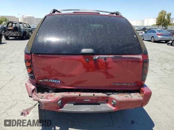 2000 Chevrolet Blazer LS with VIN 1GNCS18W6YK138400, listed as a Copart auction lot 60550575 with 166,872 mi miles and Salvage title. Bid and sale history available at DreamBid. Image 6.