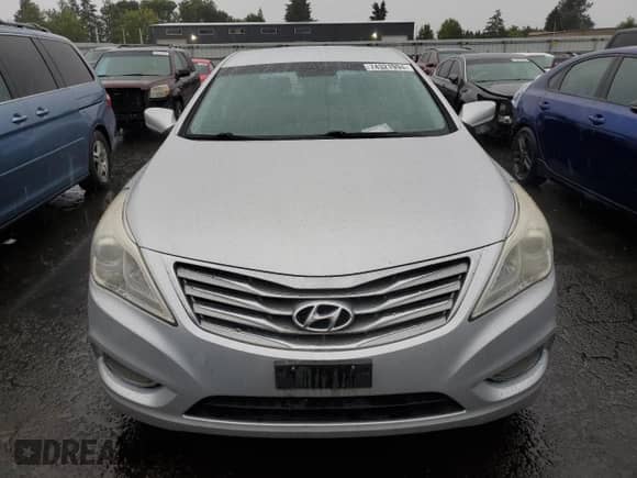 2012 Hyundai Azera с VIN KMHFG4JG0CA159474, выставлен на аукционе Copart как лот 74321994 с пробегом 167 119 миль миль и Списание • Salvage title. История ставок и продаж доступна на DreamBid. Изображение 5.