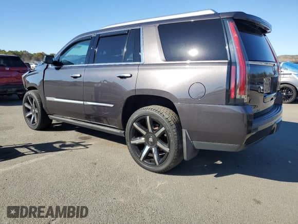 2015 Cadillac Escalade Premium with VIN 1GYS4CKJ0FR220399, listed as a Copart auction lot 89659375 with 105,848 mi miles and Salvage title. Bid and sale history available at DreamBid. Image 2.