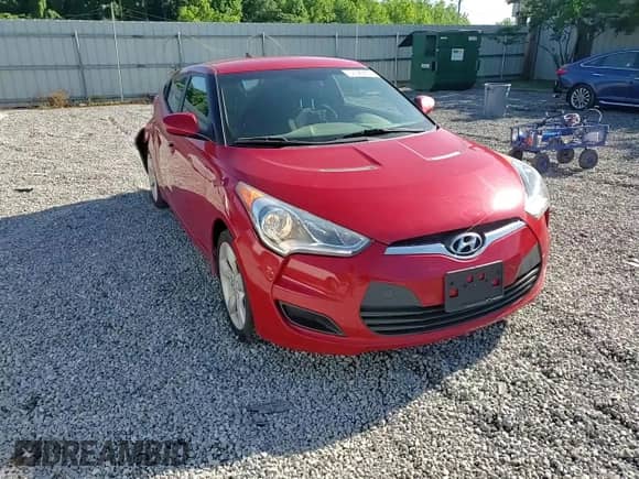 2013 Hyundai Veloster w/Black Int z VIN KMHTC6AD2DU126699, wystawiony jako Copart lot #57329805 z przebiegiem 85 303 mil mil oraz Szkoda całkowita • Salvage title. Historia ofert i sprzedaży dostępna na DreamBid. Obrazek 13.