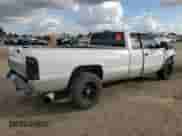 1999 Dodge 2500 with VIN 3B7KC2364XG126122, listed as a Copart auction lot 80802084 with 271,918 mi miles and Salvage title. Bid and sale history available at DreamBid. Image 3.