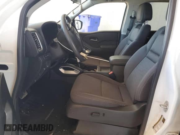 2023 Nissan Frontier SV with VIN 1N6ED1EK1PN668409, listed as a Copart auction lot 84835755 with 32,520 mi miles and Salvage title. Bid and sale history available at DreamBid. Image 7.