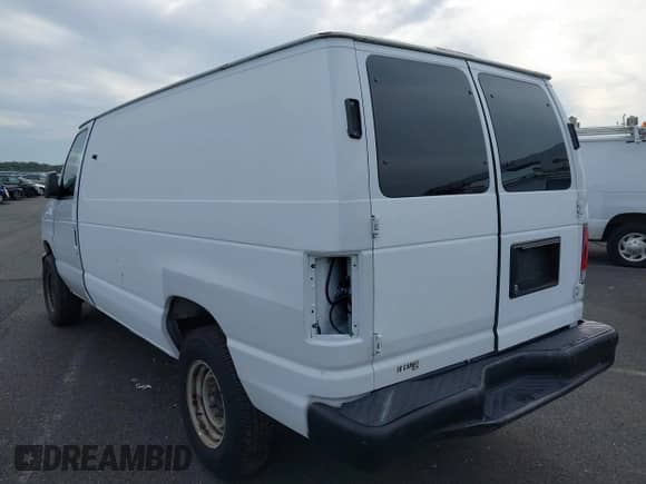 2011 Ford Econoline Cargo Commercial with VIN 1FTNE2EL2BDB32047, listed as a IAAI auction lot 43218450 with 123,619 mi miles and . Bid and sale history available at DreamBid. Image 3.