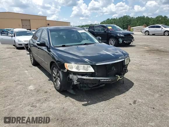 2009 Hyundai Azera Limited с VIN KMHFC46FX9A381167, выставлен на аукционе Copart как лот 61723195 с пробегом 182 359 миль миль и Списание • Salvage title. История ставок и продаж доступна на DreamBid. Изображение 14.