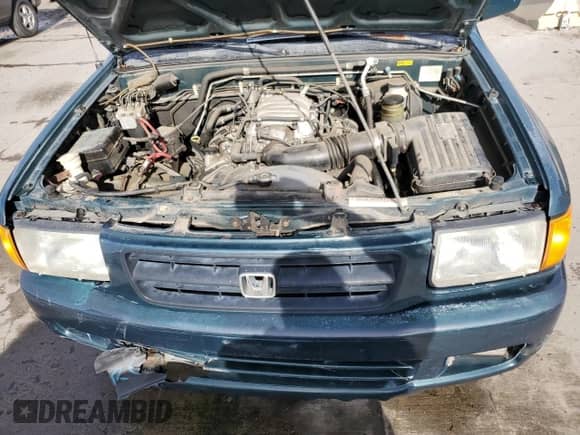 1998 Honda Passport LX with VIN 4S6CM58W2W4403473, listed as a Copart auction lot 66621474 with 154,892 mi miles and Clean title. Bid and sale history available at DreamBid. Image 12.