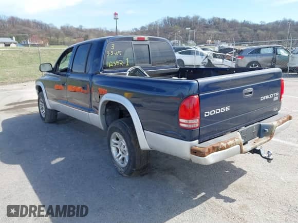 2004 Dodge Dakota SLT with VIN 1D7HG48N64S680055, listed as a IAAI auction lot 41831409 with Not provided miles and . Bid and sale history available at DreamBid. Image 3.