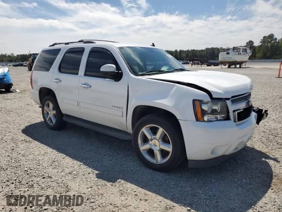 2013 Chevrolet Tahoe LT with VIN 1GNSCBE00DR216203, listed as a Copart auction lot 80108465 with 211,264 mi miles and Salvage title. Bid and sale history available at DreamBid. Image 4.