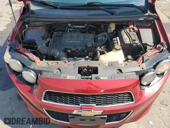 2015 Chevrolet Sonic RS z VIN 1G1JH6SB0F4167290, wystawiony jako Copart lot #69244125 z przebiegiem 82 775 mil mil oraz Szkoda całkowita • Salvage title. Historia ofert i sprzedaży dostępna na DreamBid. Obrazek 11.