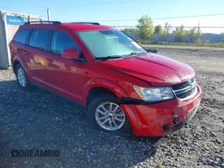 2013 Dodge Journey SXT with VIN 3C4PDCBG9DT500455, listed as a IAAI auction lot 43393751 with 189,606 mi miles and . Bid and sale history available at DreamBid. Image 1.