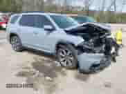 2023 Honda Pilot Touring z VIN 5FNYG2H73PB000968, wystawiony jako IAAI lot #41811452 z przebiegiem 50 000 mil mil oraz . Historia ofert i sprzedaży dostępna na DreamBid. Obrazek 1.