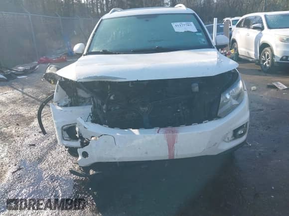 2014 Volkswagen Tiguan SEL with VIN WVGAV3AX8EW538318, listed as a IAAI auction lot 41277703 with 130,827 mi miles and . Bid and sale history available at DreamBid. Image 12.