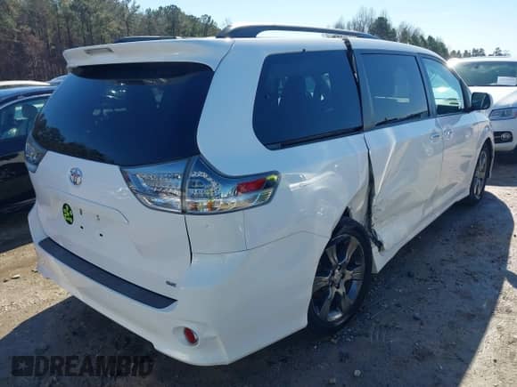 2015 Toyota Sienna SE with VIN 5TDXK3DC4FS658148, listed as a IAAI auction lot 41601341 with 110,329 mi miles and . Bid and sale history available at DreamBid. Image 4.