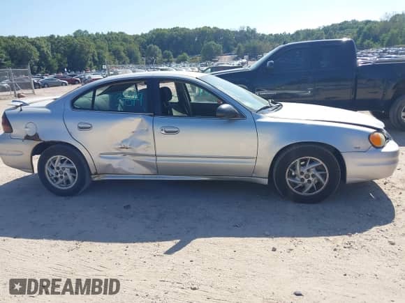 2004 Pontiac Grand Am SE1 with VIN 1G2NF52EX4C200337, listed as a IAAI auction lot 43313819 with Not provided miles and . Bid and sale history available at DreamBid. Image 12.