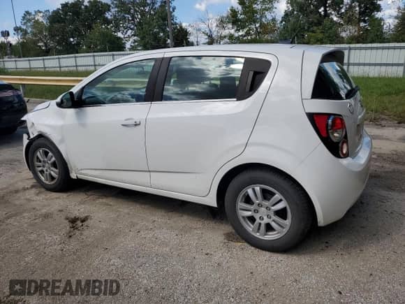 2013 Chevrolet Sonic LT with VIN 1G1JC6SG9D4206806, listed as a Copart auction lot 83852955 with 144,636 mi miles and Salvage title. Bid and sale history available at DreamBid. Image 2.