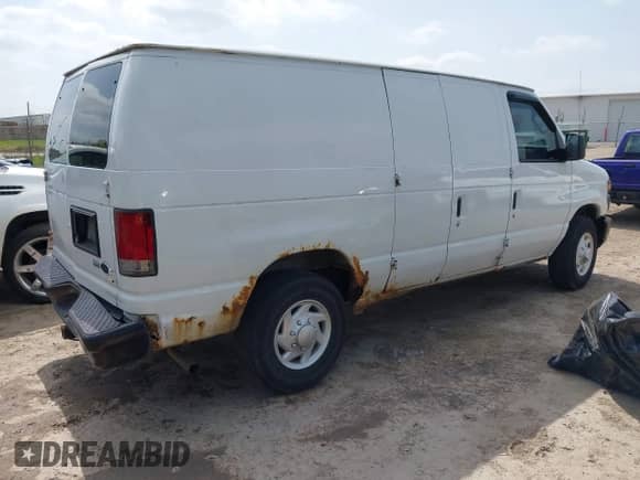 2009 Ford Econoline Cargo Commercial with VIN 1FTNE24W49DA72844, listed as a IAAI auction lot 42079600 with 221,662 mi miles and . Bid and sale history available at DreamBid. Image 4.