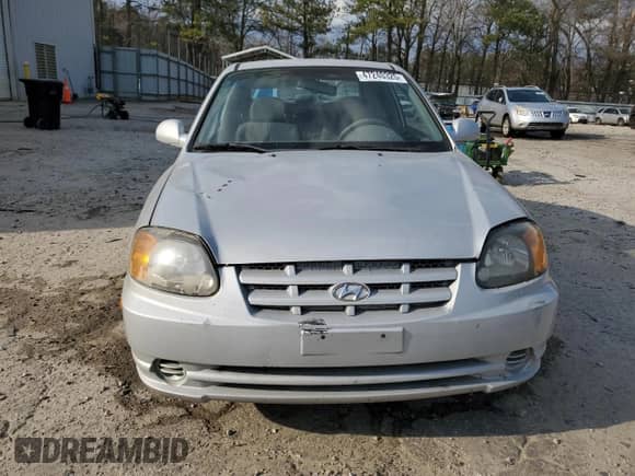 2003 Hyundai Accent GL с VIN KMHCG35CX3U270374, выставлен на аукционе Copart как лот 47240325 с пробегом 122 739 миль миль и Списание • Salvage title. История ставок и продаж доступна на DreamBid. Изображение 5.