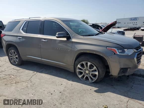2018 Chevrolet Traverse Premier z VIN 1GNERKKW6JJ160248, wystawiony jako Copart lot #64592845 z przebiegiem 181 748 mil mil oraz Szkoda całkowita • Salvage title. Historia ofert i sprzedaży dostępna na DreamBid. Obrazek 4.