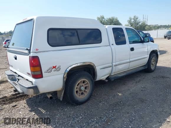 2002 GMC Sierra 1500 SLE z VIN 1GTEK19T22Z129469, wystawiony jako IAAI lot #42852319 z przebiegiem 283 614 mil mil oraz . Historia ofert i sprzedaży dostępna na DreamBid. Obrazek 4.