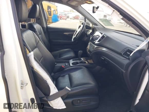 2018 Honda Pilot EX-L with VIN 5FNYF5H5XJB033220, listed as a IAAI auction lot 43205648 with 117,623 mi miles and . Bid and sale history available at DreamBid. Image 5.