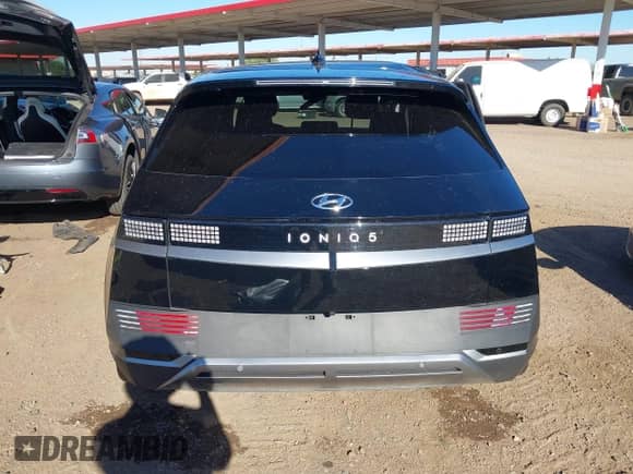 2023 Hyundai Ioniq 5 SE with VIN KM8KM4AE4PU186526, listed as a IAAI auction lot 43348590 with 26,965 mi miles and . Bid and sale history available at DreamBid. Image 16.