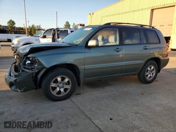 2005 Toyota Highlander with VIN JTEEP21A050097658, listed as a Copart auction lot 82513115 with 214,614 mi miles and Salvage title. Bid and sale history available at DreamBid. Image 1.