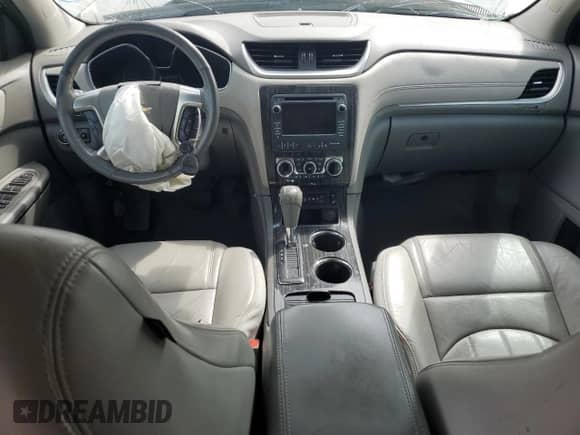 2014 Chevrolet Traverse LTZ с VIN 1GNKRJKD0EJ133998, выставлен на аукционе Copart как лот 80366065 с пробегом Не указан миль и Списание • Salvage title. История ставок и продаж доступна на DreamBid. Изображение 8.