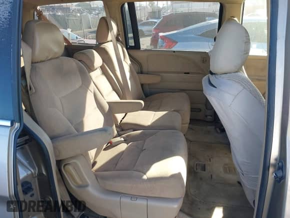 2005 Honda Odyssey EX z VIN 5FNRL38425B012621, wystawiony jako IAAI lot #43421590 z przebiegiem 216 566 mil mil oraz . Historia ofert i sprzedaży dostępna na DreamBid. Obrazek 8.