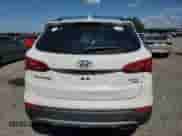 2014 Hyundai Santa Fe z VIN 5XYZUDLB7EG156988, wystawiony jako Copart lot #67725145 z przebiegiem 119 777 mil mil oraz Nie do naprawy • Non repairable. Historia ofert i sprzedaży dostępna na DreamBid. Obrazek 6.