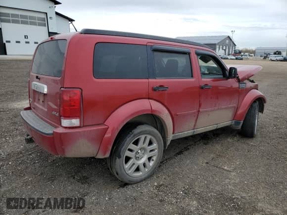 2007 Dodge Nitro SLT с VIN 1D8GU58K07W651434, выставлен на аукционе Copart как лот 76686794 с пробегом 181 168 миль миль и Списание • Salvage title. История ставок и продаж доступна на DreamBid. Изображение 3.