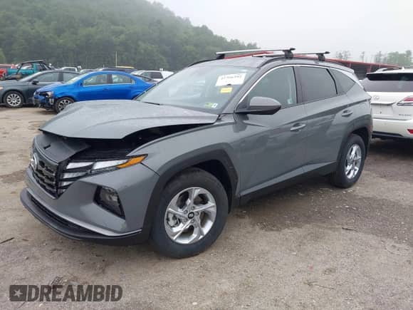 2024 Hyundai Tucson SEL z VIN 5NMJBCDE2RH405098, wystawiony jako IAAI lot #42766392 z przebiegiem 3 902 mil mil oraz . Historia ofert i sprzedaży dostępna na DreamBid. Obrazek 17.