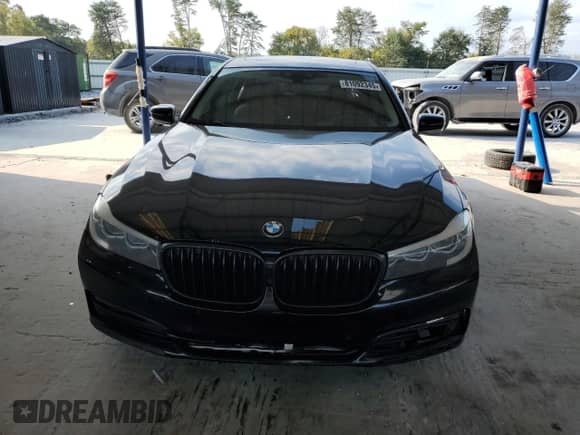 2016 BMW 7 Series 740i z VIN WBA7E2C52GG504132, wystawiony jako Copart lot #81092345 z przebiegiem 139 249 mil mil oraz Czysty tytuł • Clean title. Historia ofert i sprzedaży dostępna na DreamBid. Obrazek 5.