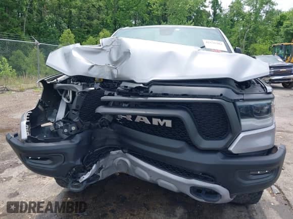 2020 Ram 1500 Rebel with VIN 1C6SRFLT8LN229872, listed as a IAAI auction lot 42135383 with 71,741 mi miles and . Bid and sale history available at DreamBid. Image 6.