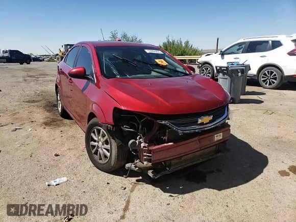 2018 Chevrolet Sonic LT with VIN 1G1JD5SB3J4139708, listed as a Copart auction lot 53909265 with 128,103 mi miles and Salvage title. Bid and sale history available at DreamBid. Image 13.