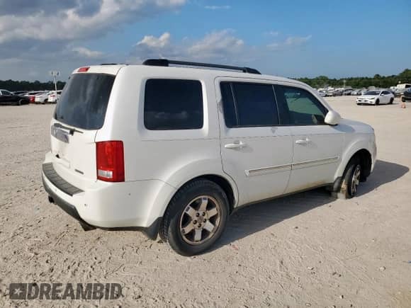 2011 Honda Pilot Touring с VIN 5FNYF3H98BB029742, выставлен на аукционе Copart как лот 70890845 с пробегом 222 211 миль миль и Списание • Salvage title. История ставок и продаж доступна на DreamBid. Изображение 3.