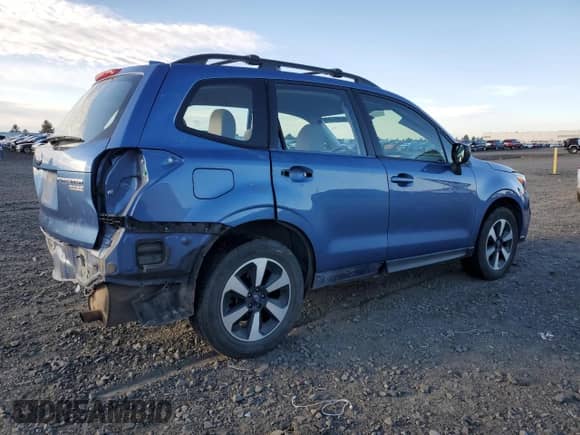 2017 Subaru Forester with VIN JF2SJABC6HH561546, listed as a Copart auction lot 82573365 with 102,075 mi miles and Salvage title. Bid and sale history available at DreamBid. Image 3.