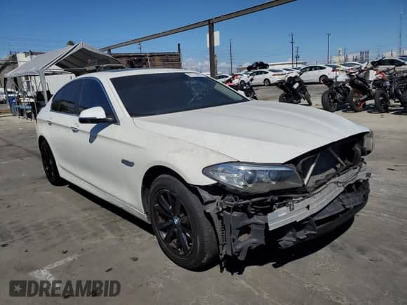 2015 BMW 5 Series 528i xDrive with VIN WBA5A7C52FD627302, listed as a Copart auction lot 81716085 with 101,095 mi miles and Salvage title. Bid and sale history available at DreamBid. Image 4.