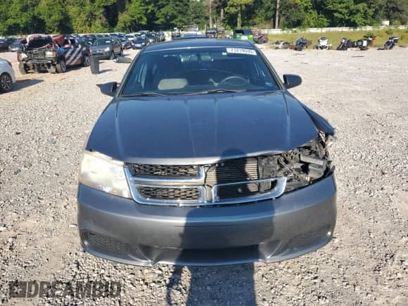 2013 Dodge Avenger SE с VIN 1C3CDZABXDN690388, выставлен на аукционе Copart как лот 71219535 с пробегом 160 942 миль миль и Списание • Salvage title. История ставок и продаж доступна на DreamBid. Изображение 5.