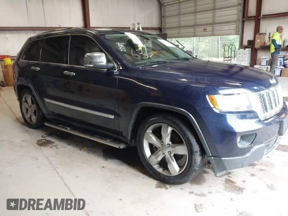 2012 Jeep Grand Cherokee Overland z VIN 1C4RJFCG1CC262788, wystawiony jako IAAI lot #43212743 z przebiegiem 211 731 mil mil oraz . Historia ofert i sprzedaży dostępna na DreamBid. Obrazek 1.