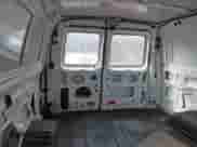 2011 Ford Econoline Cargo Commercial with VIN 1FTNE1EW5BDB06014, listed as a IAAI auction lot 43124379 with 194,797 mi miles and . Bid and sale history available at DreamBid. Image 8.