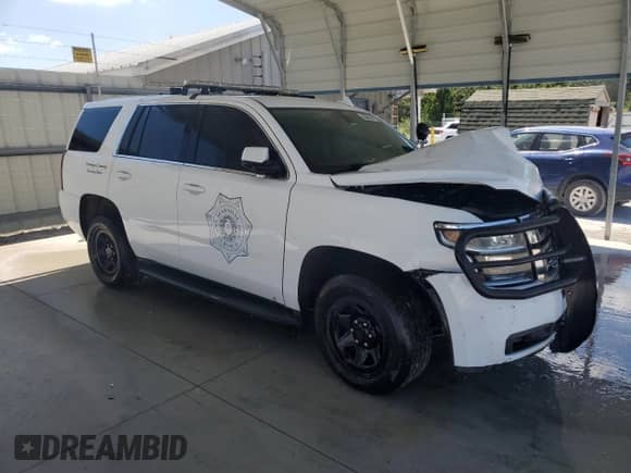2020 Chevrolet Tahoe Commercial with VIN 1GNSKDEC6LR169136, listed as a Copart auction lot 70102885 with 74,231 mi miles and Clean title. Bid and sale history available at DreamBid. Image 4.