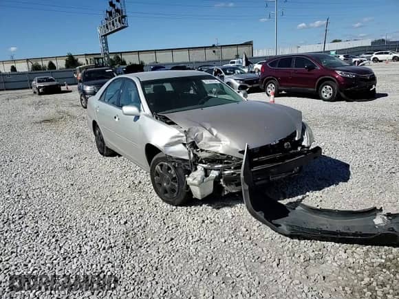 2003 Toyota Camry XLE с VIN 4T1BE32K93U230591, выставлен на аукционе Copart как лот 82388735 с пробегом 185 254 миль миль и Списание • Salvage title. История ставок и продаж доступна на DreamBid. Изображение 14.