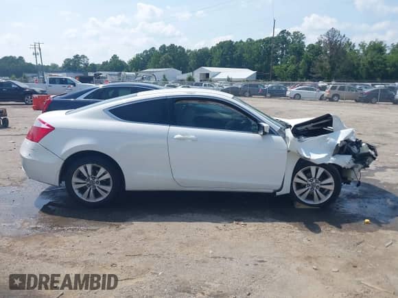 2009 Honda Accord LX-S with VIN 1HGCS12319A012610, listed as a IAAI auction lot 42764849 with 318,331 mi miles and . Bid and sale history available at DreamBid. Image 13.