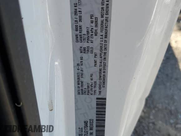 2020 Ram 1500 Tradesman z VIN 3C6JR6DT7LG170445, wystawiony jako Copart lot #80922994 z przebiegiem Nie podano mil oraz Szkoda całkowita • Salvage title. Historia ofert i sprzedaży dostępna na DreamBid. Obrazek 12.