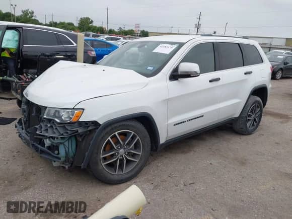 2018 Jeep Grand Cherokee Sterling with VIN 1C4RJEBG5JC221735, listed as a IAAI auction lot 42182575 with 123,505 mi miles and . Bid and sale history available at DreamBid. Image 2.