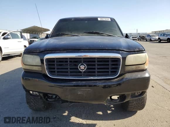 2000 Cadillac Escalade z VIN 1GYEK13R4YR103293, wystawiony jako Copart lot #58673244 z przebiegiem Nie podano mil oraz Nie do naprawy • Non repairable. Historia ofert i sprzedaży dostępna na DreamBid. Obrazek 5.