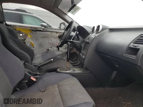 2005 Hyundai Tiburon GS with VIN KMHHM65D05U184230, listed as a Copart auction lot 80068374 with 135,076 mi miles and Salvage title. Bid and sale history available at DreamBid. Image 10.