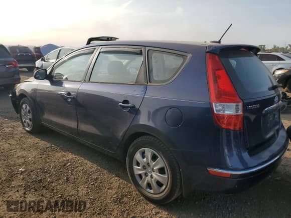 2011 Hyundai Elantra GLS with VIN KMHDB8AEXBU100988, listed as a Copart auction lot 70205005 with 149,951 mi miles and Salvage title. Bid and sale history available at DreamBid. Image 2.