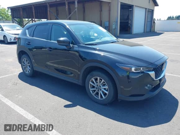 2023 Mazda CX-5 S Preferred z VIN JM3KFBCM1P0131456, wystawiony jako IAAI lot #42696205 z przebiegiem 65 060 mil mil oraz . Historia ofert i sprzedaży dostępna na DreamBid. Obrazek 1.